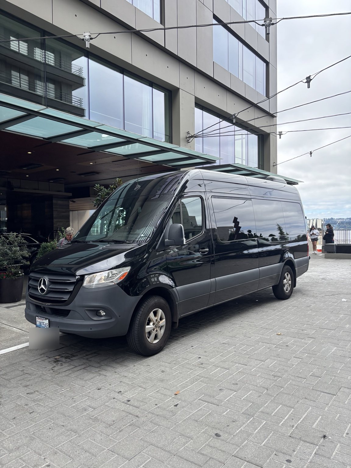 Black Mercedes-Benz Sprinter executive van
